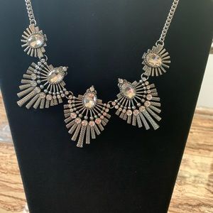 3 Pretty necklace sets with earrings.